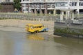 Amphibious tourist bus on River Thames. London UK