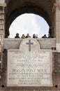 Amphitheater flavio (Coliseum) in Rome. Marble latin plaque. Tourist Royalty Free Stock Photo