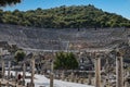 Amphitheatre in the ruins of Ephesus, Turkey, with hills and blue sky in the background