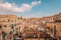 Ampia vista dei Sassi di Matera dal Belvedere Luigi Guerricchio, cielo azzurro con nuvole