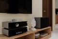 Amplifiers High Volume Sound-box on the TV Console table, 3D rendering