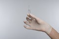 Ampoule hand in glove Royalty Free Stock Photo