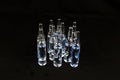 Ampoules with a solution on a black background. Royalty Free Stock Photo