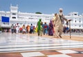 Amritsar, India - AUGUST 15: Portrait of indian Sikh old man walking by the marble stone floor in Golden Temple Harmandir Sahib Royalty Free Stock Photo