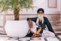 Amritsar, India - AUGUST 15: Portrait of an Old Sikh sitting at Golden Temple Harmandir Sahib on August 15, 2016 in Amritsar,