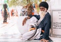 Amritsar, India - AUGUST 15: Portrait of an Old Sikh sitting at Golden Temple Harmandir Sahib on August 15, 2016 in Amritsar,