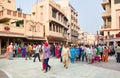 Amritsar, INDIA: Crowd of visitors or pilgrims on the street with newly built architecture leading to Harmandir