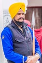 AMRITSAR, INDIA - JANUARY 26, 2017: Sikh warrior with a spear on a guard in the Golden Temple Harmandir Sahib in Amritsar, Punjab