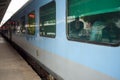 Amritsar, India, May 03 2024 - Indian railway train at Amritsar railway station platform during morning time, Colourful train at