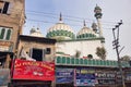 Amritsar, India : View of Mosque on a way to Harmandir sahib Golden temple with bunch shop description on board