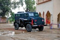 Amritsar, Punjab, India - September 28 2019: Black armored car with a soldier and a machine gun on top