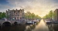 River, traditional old houses and boats, Amsterdam Royalty Free Stock Photo