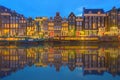 Amstel river, canals and night view of beautiful Amsterdam city. Netherlands Royalty Free Stock Photo