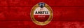 Amstel sign. Close-up Amstel logo on wooden surface Royalty Free Stock Photo