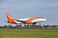 Amsterdam Airport Schiphol - Airbus A319-111 of easyJet lands Royalty Free Stock Photo