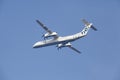 Amsterdam Airport Schiphol - Bombardier Dash of Flybe takes off Royalty Free Stock Photo