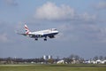 Amsterdam Airport Schiphol - British Airways Embraer 190 lands Royalty Free Stock Photo