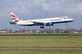 Amsterdam Airport Schiphol - British Airways Embraer 190 lands Royalty Free Stock Photo