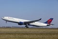 Amsterdam Airport Schiphol - Delta Air Lines Airbus A330 takes off