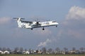 Amsterdam Airport Schiphol - Flybe Bombardier Dash lands Royalty Free Stock Photo