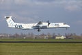 Amsterdam Airport Schiphol - Flybe Bombardier Dash lands Royalty Free Stock Photo