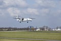 Amsterdam Airport Schiphol - Flybe Bombardier Dash 8 lands Royalty Free Stock Photo