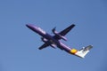 Amsterdam Airport Schiphol - Flybe Bombardier Dash takes off Royalty Free Stock Photo