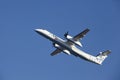 Amsterdam Airport Schiphol - Flybe Bombardier Dash takes off Royalty Free Stock Photo