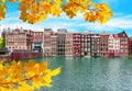 Amsterdam architecture at Damrak canal in autumn, Netherlands Royalty Free Stock Photo