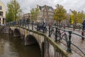 Amsterdam. Beautiful view of Amsterdam Canals with Bridge and typical Dutch Houses Royalty Free Stock Photo