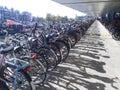 Cycles and bicycles parked n the cycle park in Amsterdam, holland, europe