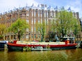 Amsterdam boat on river Brod na reci u Amsterdamu Royalty Free Stock Photo