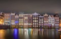 Amsterdam buildings at dusk with water canals and reflections, Netherlands Royalty Free Stock Photo