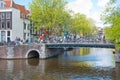 Amsterdam canal along the bank of the river in the spring. Netherlands. Royalty Free Stock Photo