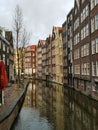 Amsterdam canal bend and traditional buildings