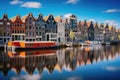 Amsterdam canal with colorful houses and boats, Holland, Netherlands, Amsterdam Netherlands dancing houses over river Amstel