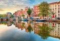 Amsterdam Canal houses vibrant reflections, Netherlands, panora