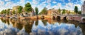 Amsterdam Canal houses vibrant reflections, Netherlands, panora
