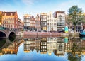 Amsterdam canal Singel with typical dutch houses, Holland, Netherlands. Royalty Free Stock Photo