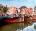 Amsterdam canal Singel with typical dutch houses, Holland, Netherlands Royalty Free Stock Photo