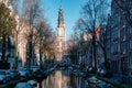 Amsterdam canal with view at the Zuiderkerk Amsterdam church canalside Netherlands