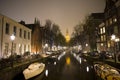 Amsterdam canals, night scene in old city with boats and lights reflected in water, Amsterdam, Netherland, March 24, 2019 Royalty Free Stock Photo