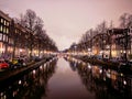 Amsterdam canals at night in winter Royalty Free Stock Photo