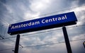 Amsterdam Central station sign post on the train station platform Royalty Free Stock Photo