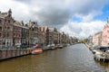 Amsterdam channels, historical places of Amsterdam, beautiful houses along the river