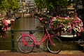 Amsterdam city bike on the canal bridge