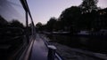 Amsterdam city canal tour at dusk