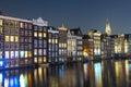 Amsterdam City Center. Beautiful view of Amsterdam Canals with Bridge and typical Dutch Houses. Netherlands Royalty Free Stock Photo