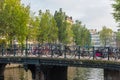 Amsterdam City Center. Beautiful view of Amsterdam Canals with Bridge and typical Dutch Houses. Netherlands Royalty Free Stock Photo