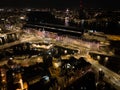 Amsterdam city center skyline by night aerial drone overhead view. Amsterdam Centraal, Ij, Oosterdok, Prins Hendrikkade Royalty Free Stock Photo